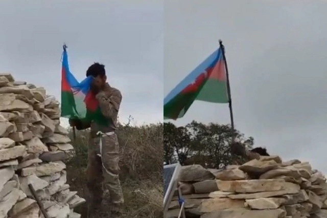 Азербайджанский военнослужащий водрузил наш трехцветный флаг в Ходжалинском районе - ВИДЕО
