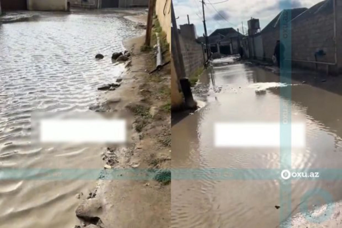 В бакинском поселке затопило дороги: местные жители пользуются узкой тропинкой - ВИДЕО