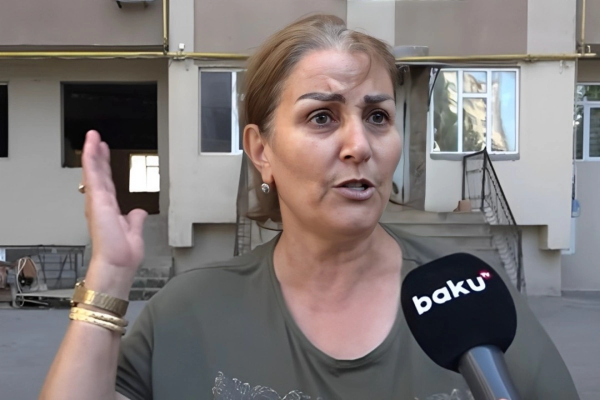 Bakıda yanğın baş verən binanın sakinləri: "Şam işığında otururuq"