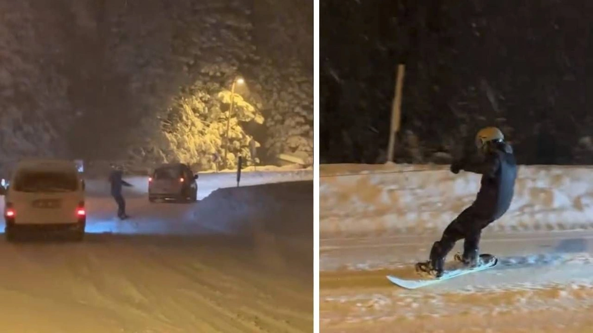 Adrenalin tutkunu vatandaş, Uludağ'dan şehre snowboard ile indi